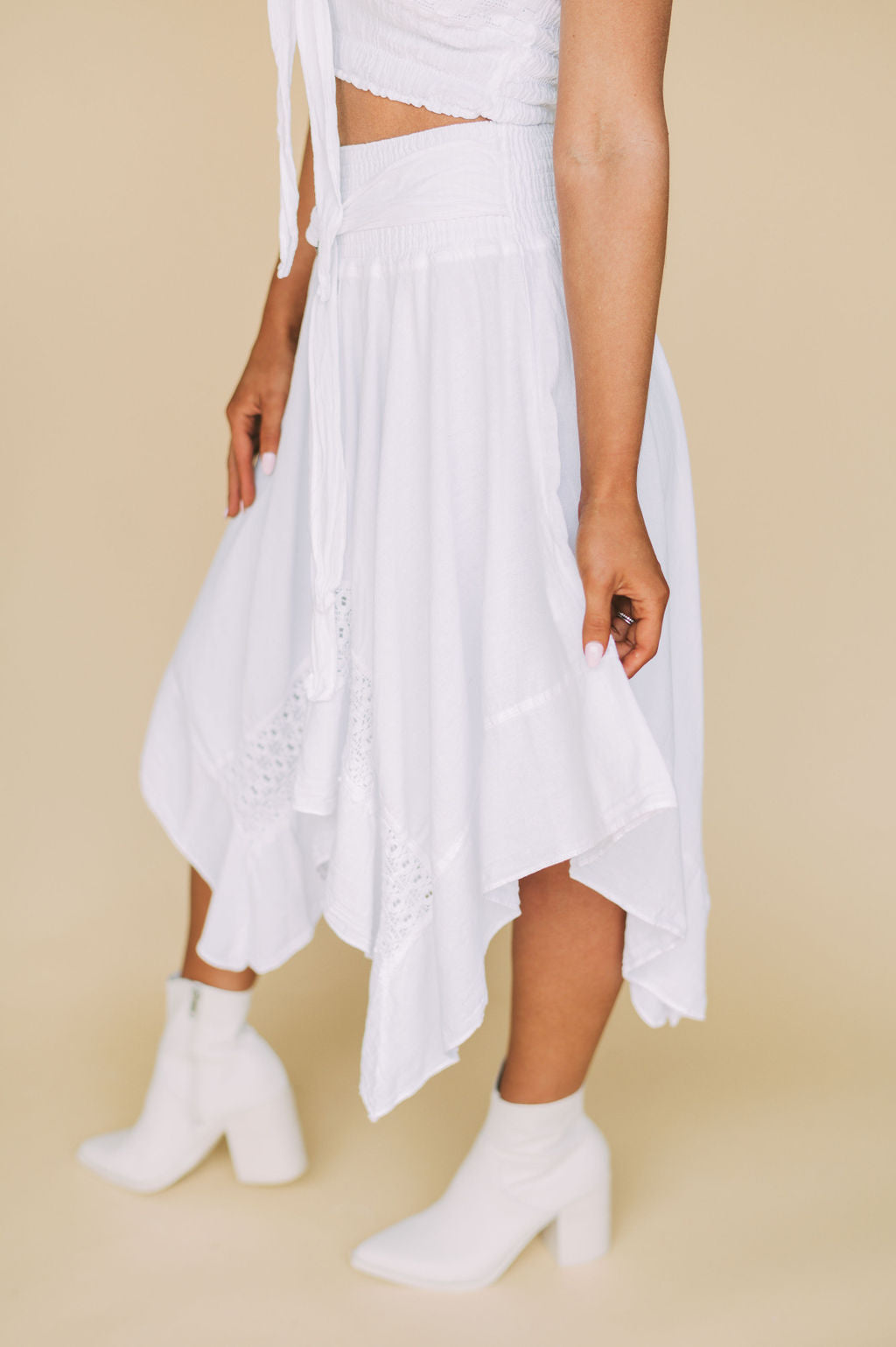 White asymmetrical outlet wrap skirt