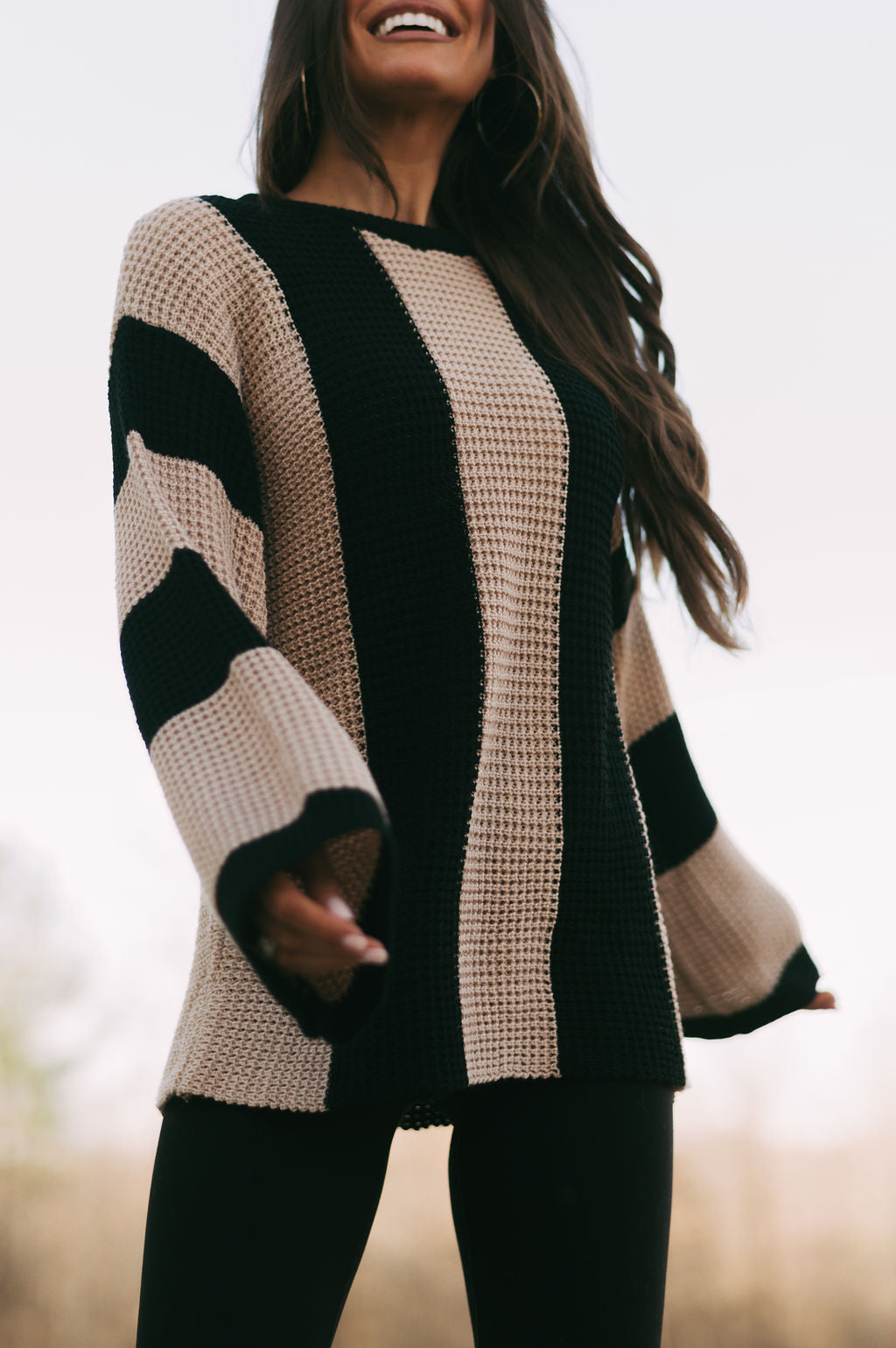 Striped bell sleeve top sweater